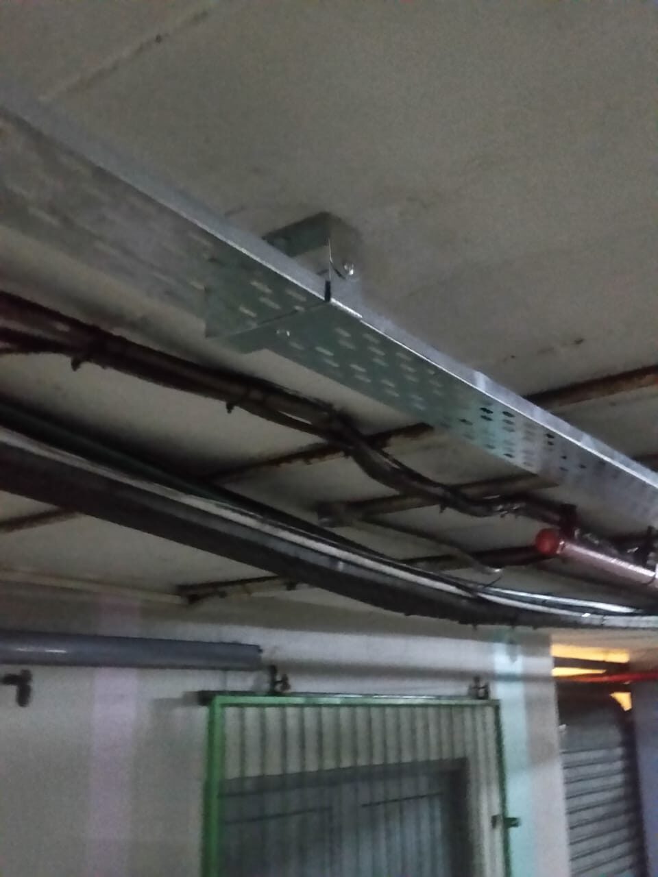 Overhead cable tray and conduit containment routes